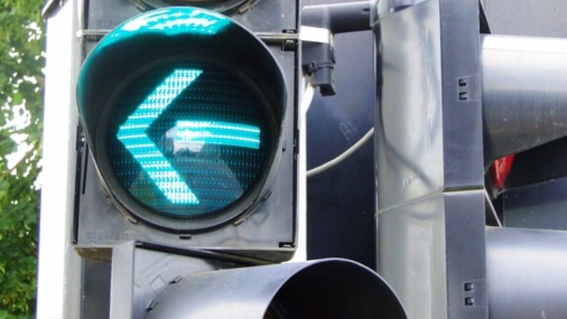 Image showing traffic signal with left green arrow on