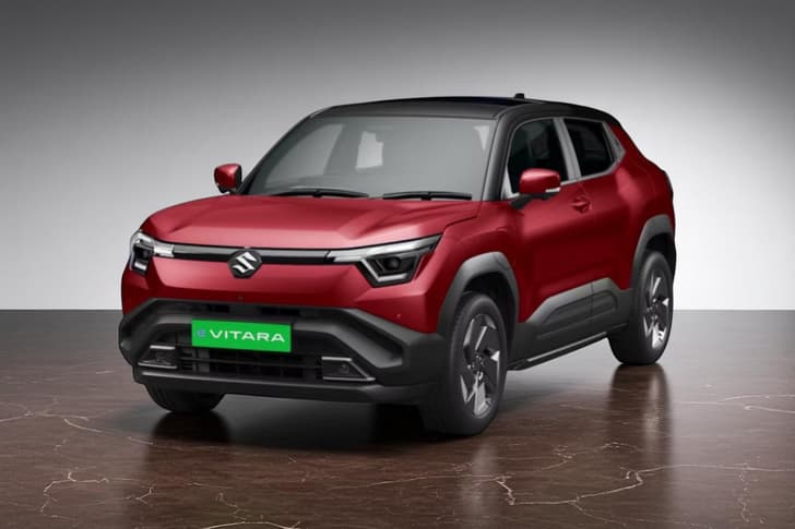 20250625034829_Maruti_Suzuki_e-Vitara_Opulent_Red_with_Bluish_Black_Roofjpg[1] (1)